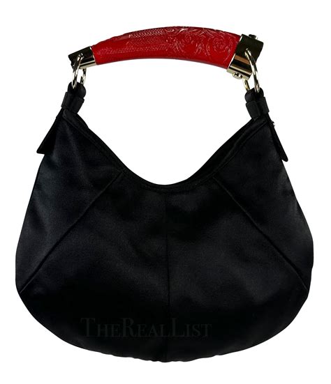 Yves Saint Laurent: a Black Satin Mini Mombasa Bag